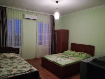 Фото номера Четырехместный номер Гостевой дом Tamila Apartment г. Сарпи 10